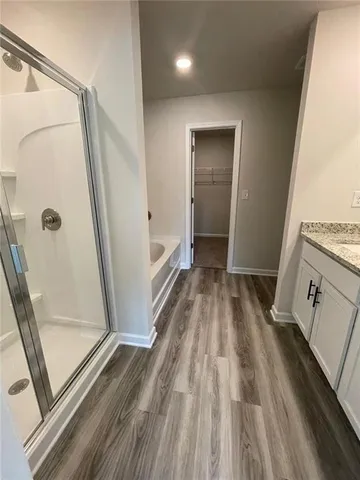 a view of a bathroom from a hallway