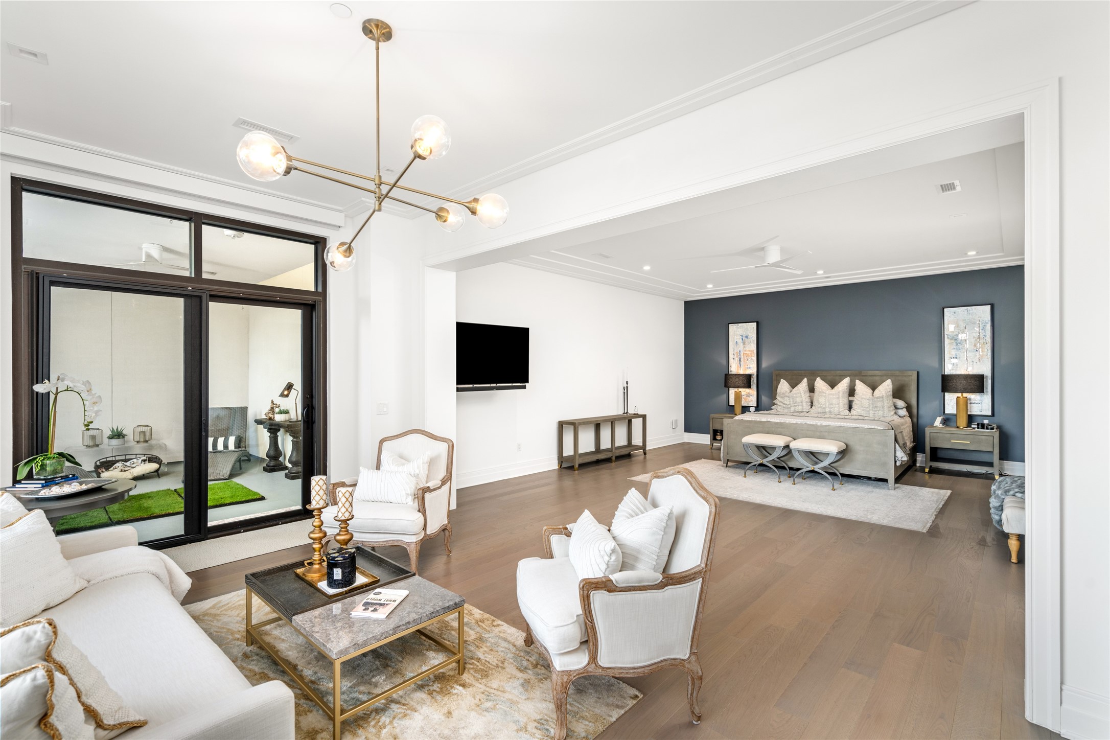 6017 Memorial Drive, Unit 202 Houston, TX 77007 - Photo 11 of 36 As you enter the serene primary suite, one can only be in awe at how expansive and relaxing the space is – from the inviting sitting area, the private secondary terrace, and the stately sleeping area, defined by clean architectural lines and balanced proportions.