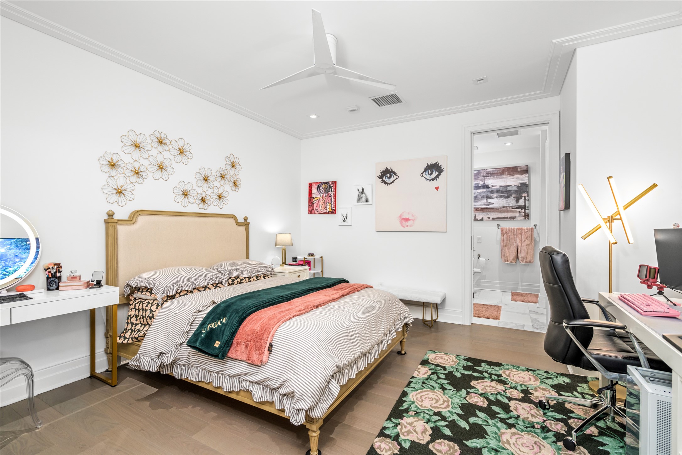 6017 Memorial Drive, Unit 202 Houston, TX 77007 - Photo 21 of 36 Privately positioned down the hallway from the elevator entry, the guest bedroom provides a quiet retreat separate from the main living spaces. You’ll also find a huge walk-in closet tastefully configured with custom storage by Space Manager.