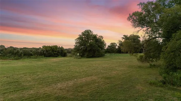 a view of an outdoor space and a yard