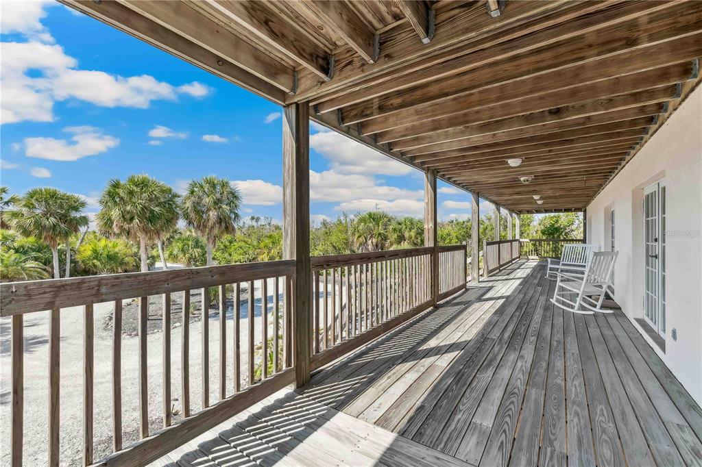 4190 Loomis Avenue Boca Grande, FL 33921 - Photo 16 of 24 a view of balcony with wooden floor