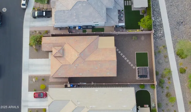 a view of multiple houses with outdoor space