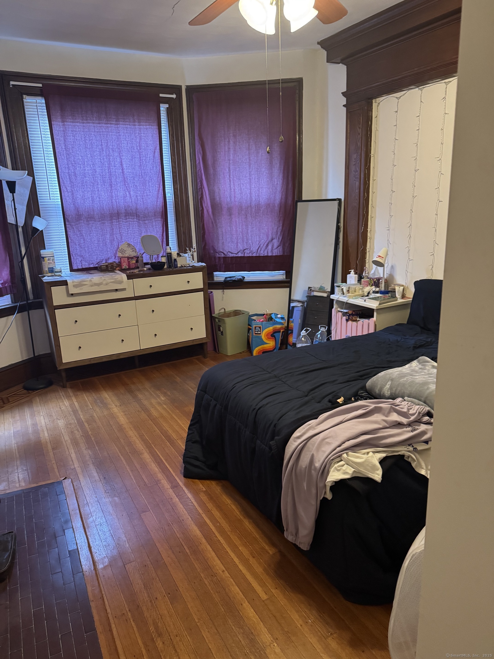 250 Willow Street, Unit 2 New Haven, CT 06511 - Photo 13 of 25 a bedroom with two beds and wooden floor