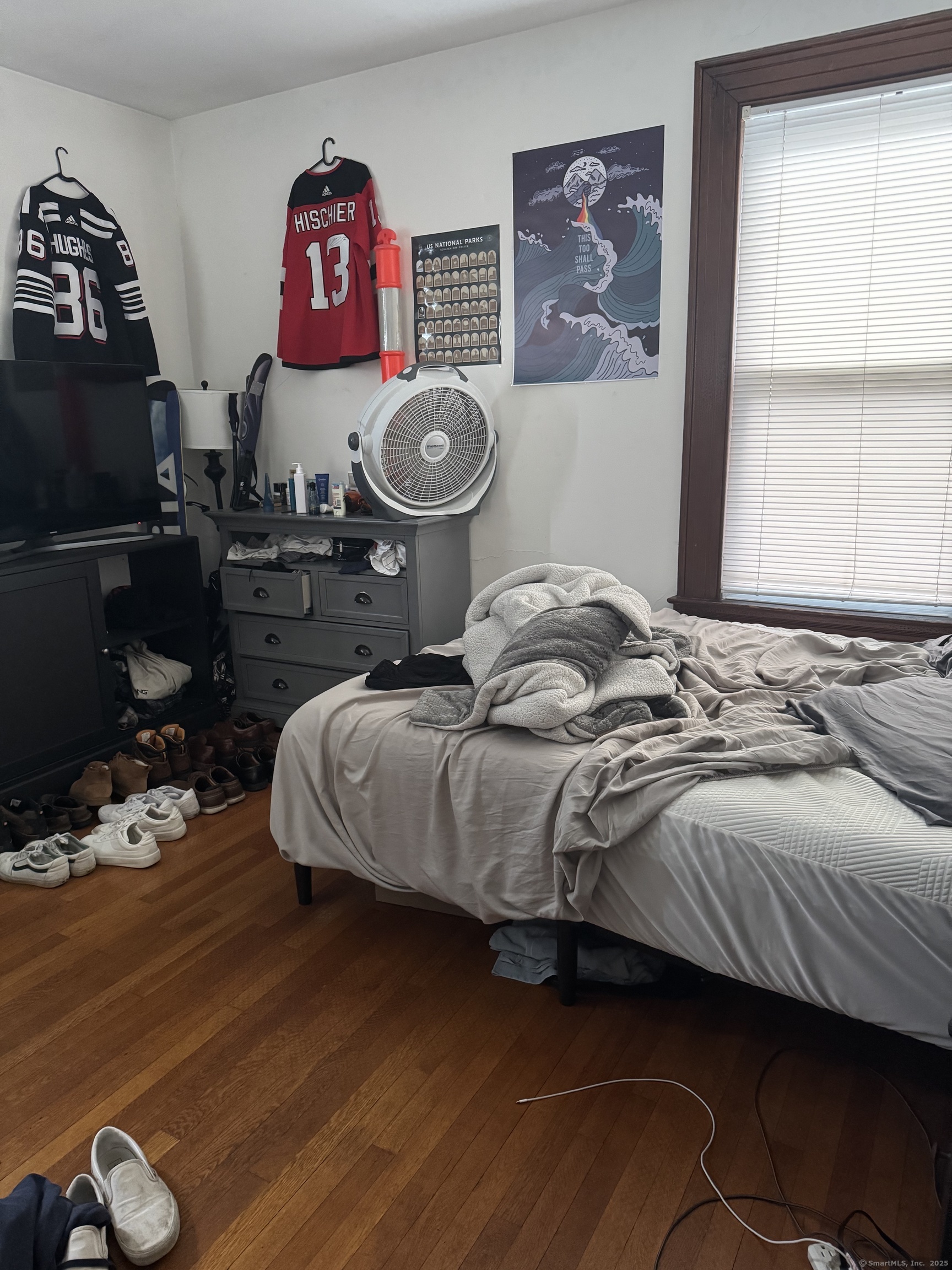 250 Willow Street, Unit 2 New Haven, CT 06511 - Photo 21 of 25 a bedroom with bed and wooden floor