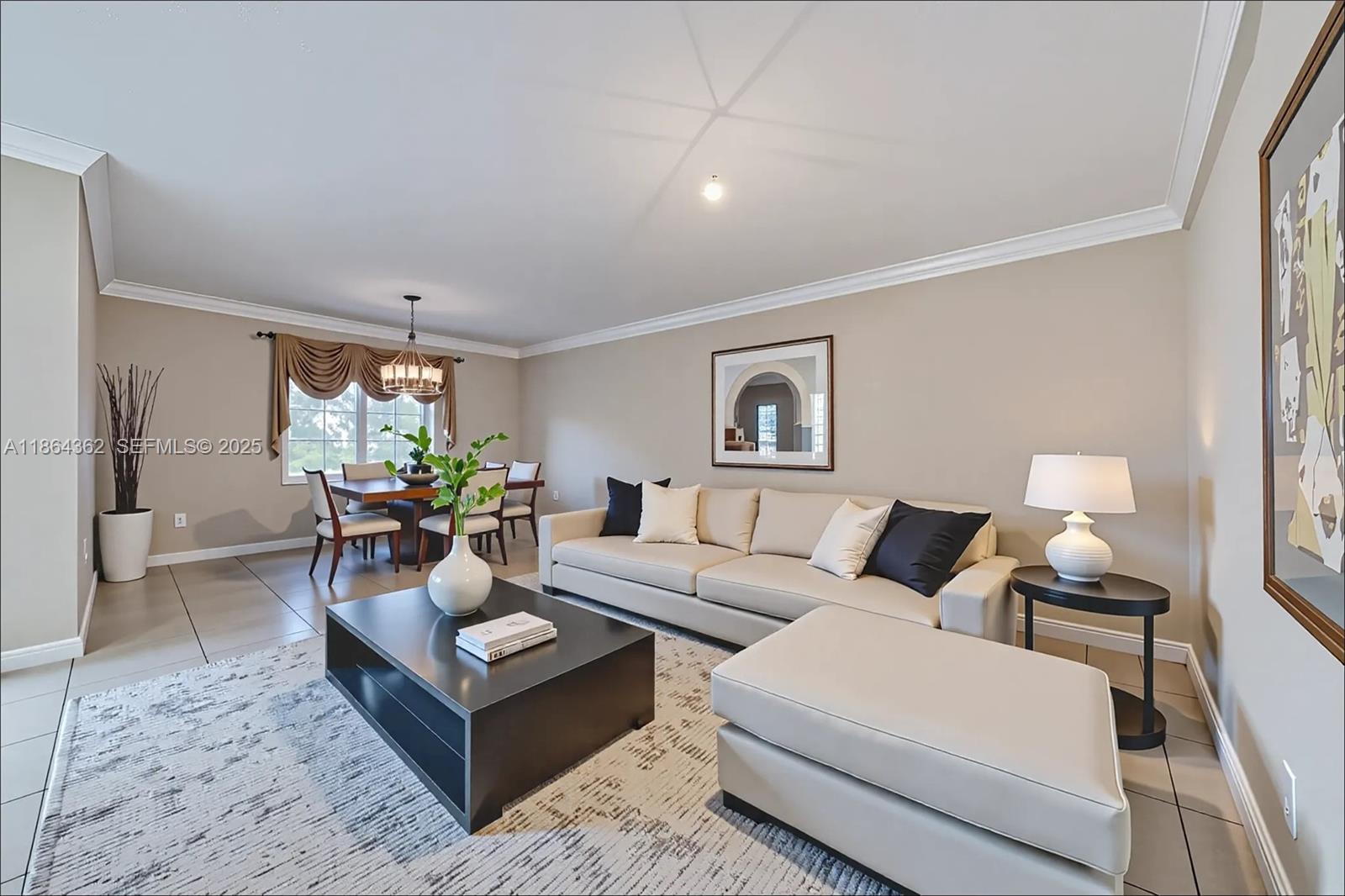 16886 Southwest 143rd Place Miami, FL 33177 - Photo 11 of 39 a living room with furniture and a wooden floor