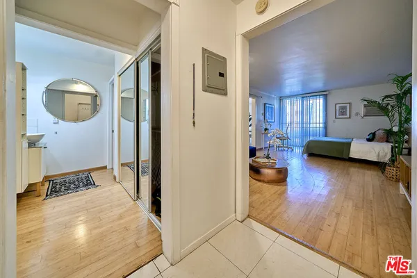 a view of a living room and hardwood floor