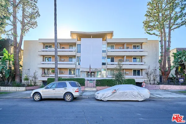 a cars parked in front of a building