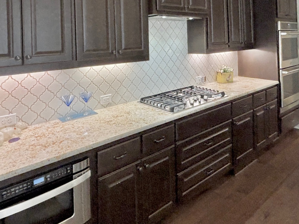 820 Desaix Drive Georgetown, TX 78628 - Photo 15 of 35 a kitchen with a sink stove and cabinets