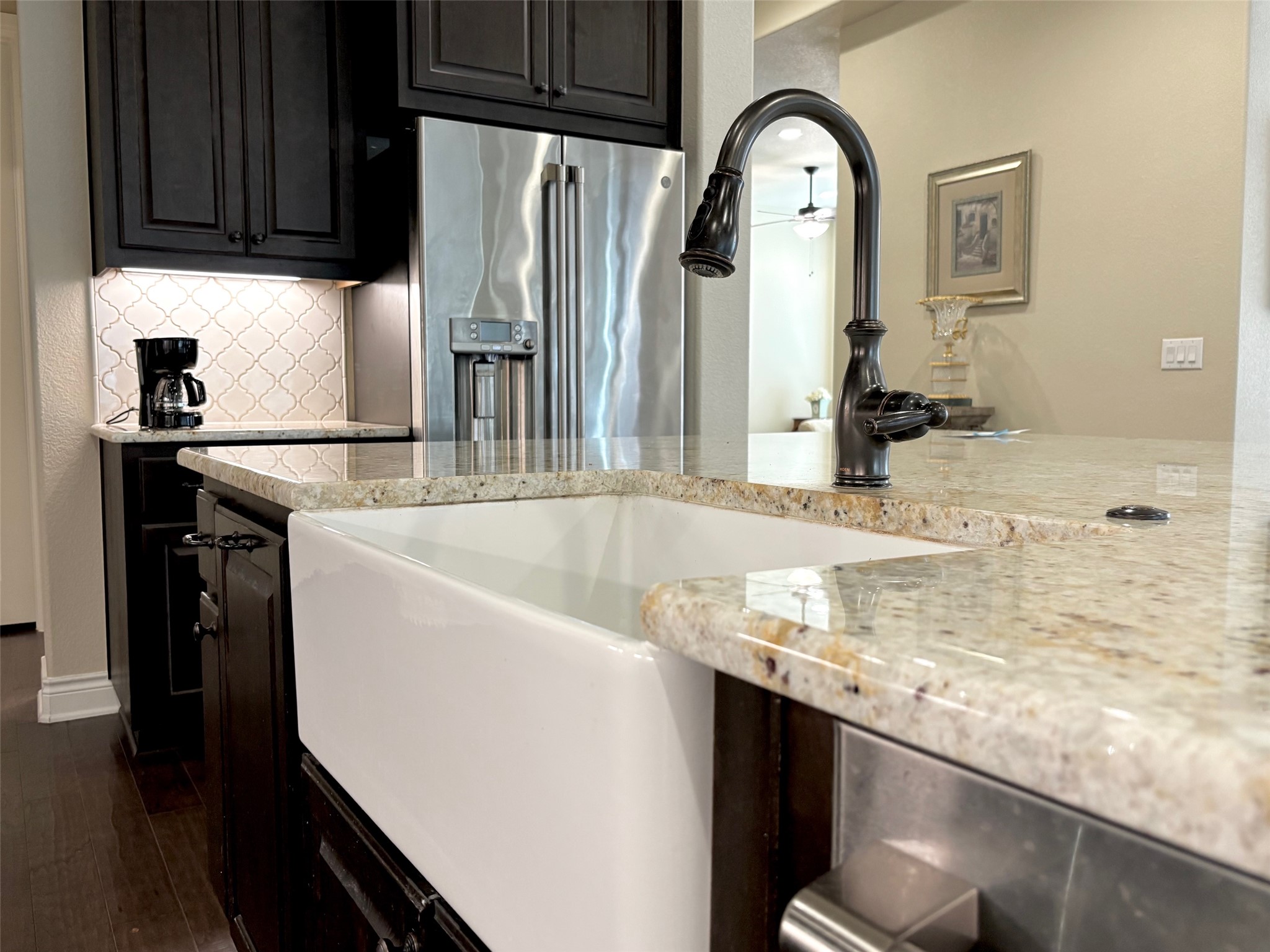 820 Desaix Drive Georgetown, TX 78628 - Photo 18 of 35 a view of a kitchen with stainless steel appliances granite countertop a sink and cabinets