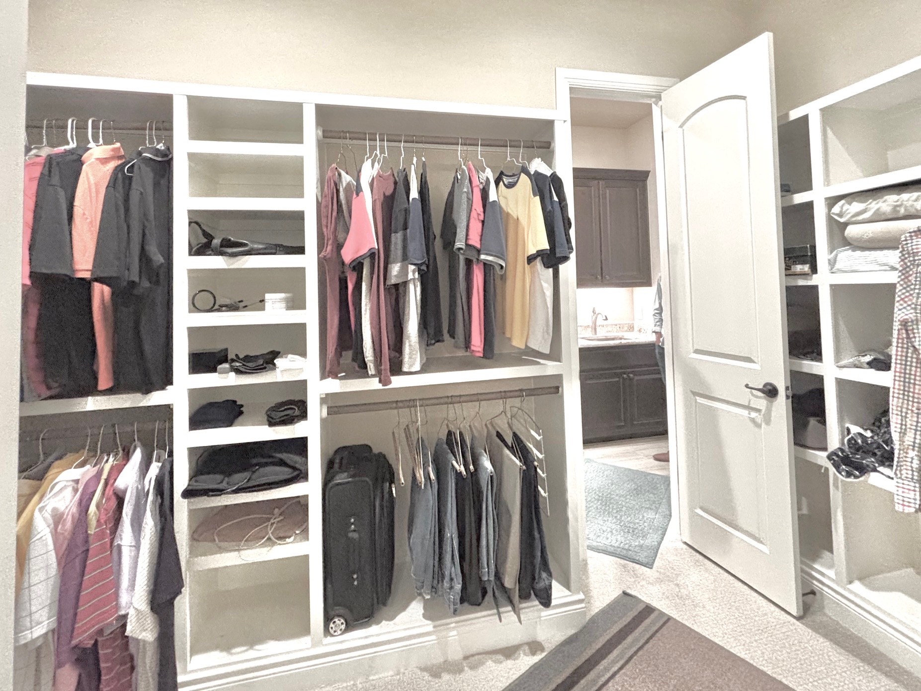 820 Desaix Drive Georgetown, TX 78628 - Photo 25 of 35 a view of walk in closet with clothes and shoes