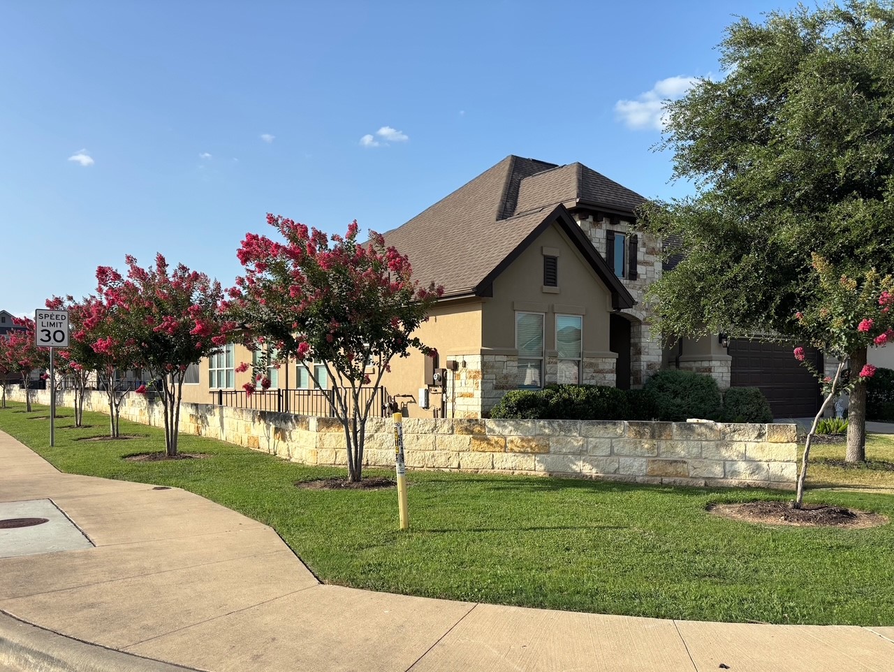 820 Desaix Drive Georgetown, TX 78628 - Photo 3 of 35 a front view of a house with a garden and yard