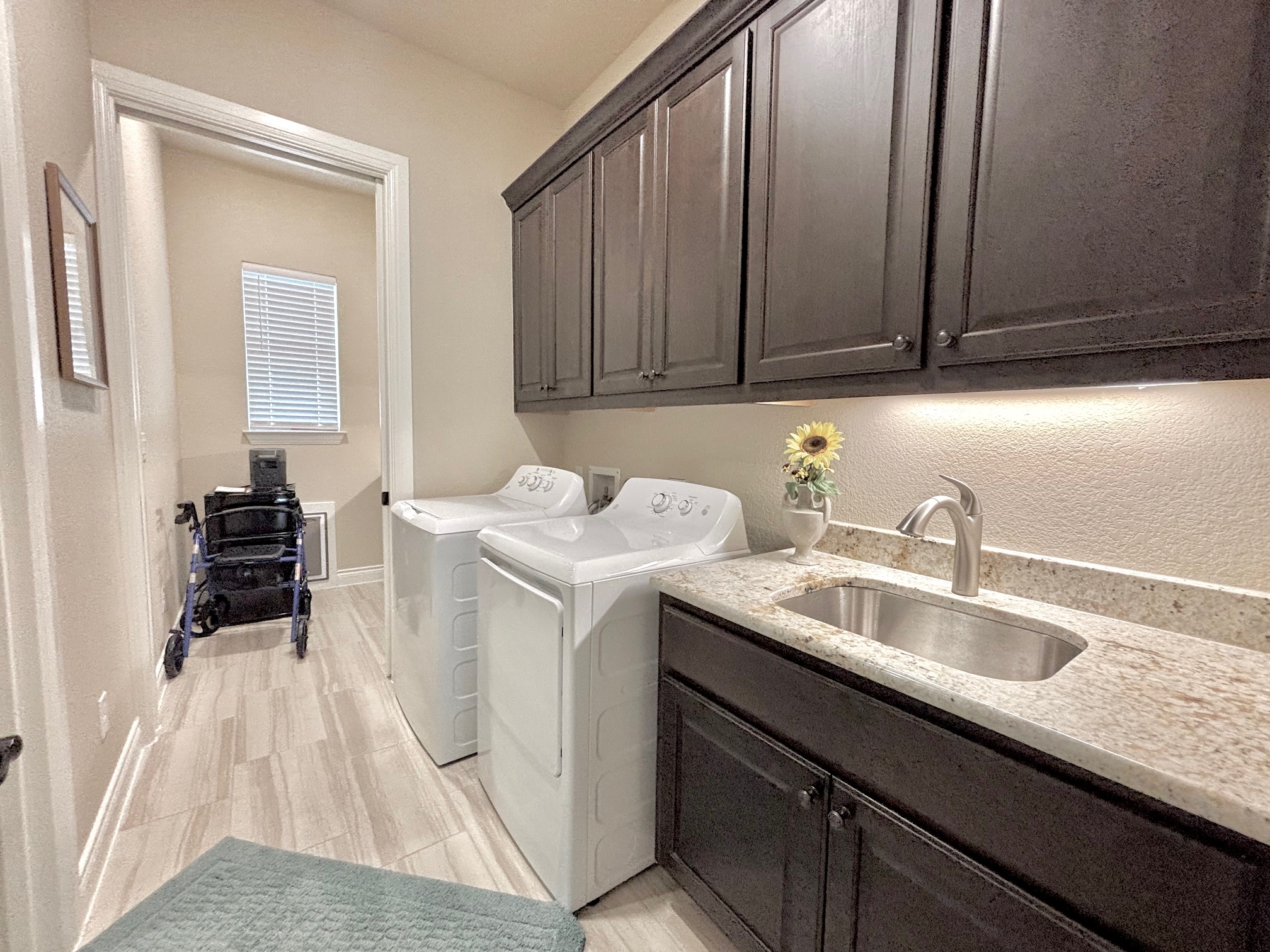 820 Desaix Drive Georgetown, TX 78628 - Photo 33 of 35 a kitchen with a sink and cabinets