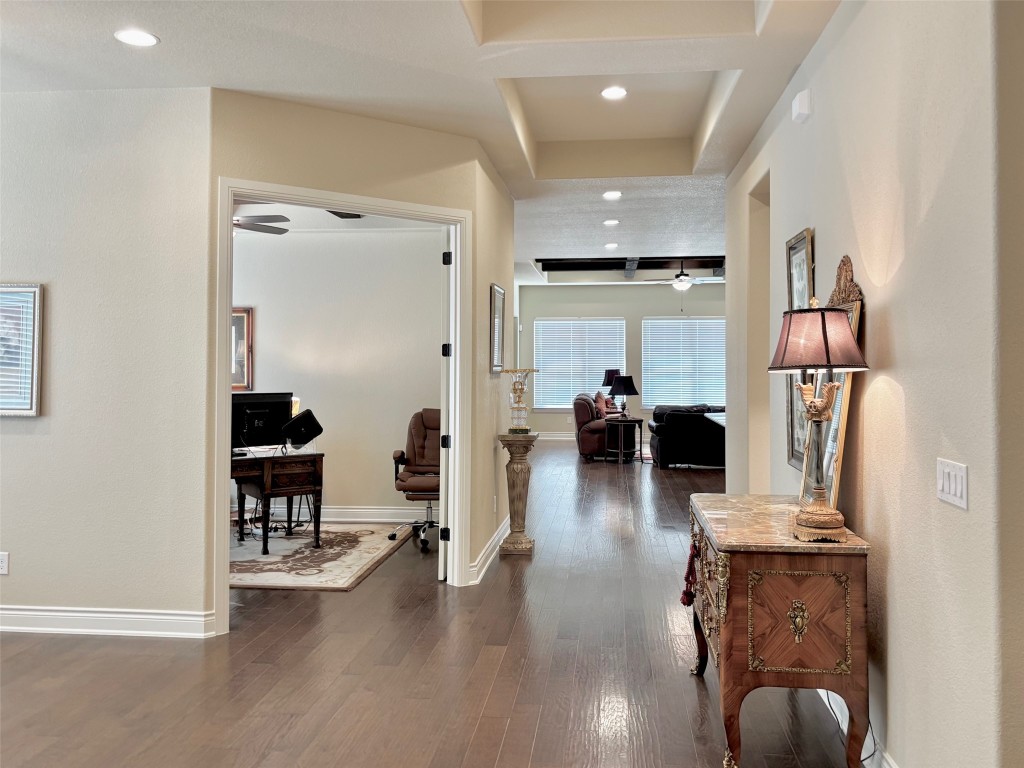 820 Desaix Drive Georgetown, TX 78628 - Photo 4 of 35 a living room with furniture and a wooden floor