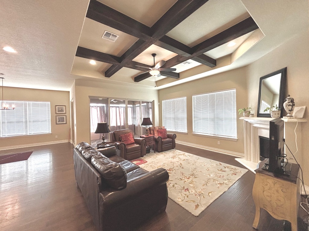 820 Desaix Drive Georgetown, TX 78628 - Photo 8 of 35 a living room with fireplace furniture and a large window