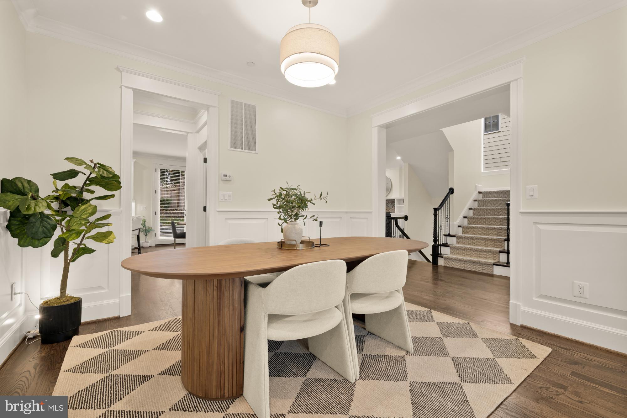 4609 Glenbrook Parkway Bethesda, MD 20814 - Photo 11 of 62 a view of a dining room with furniture and wooden floor