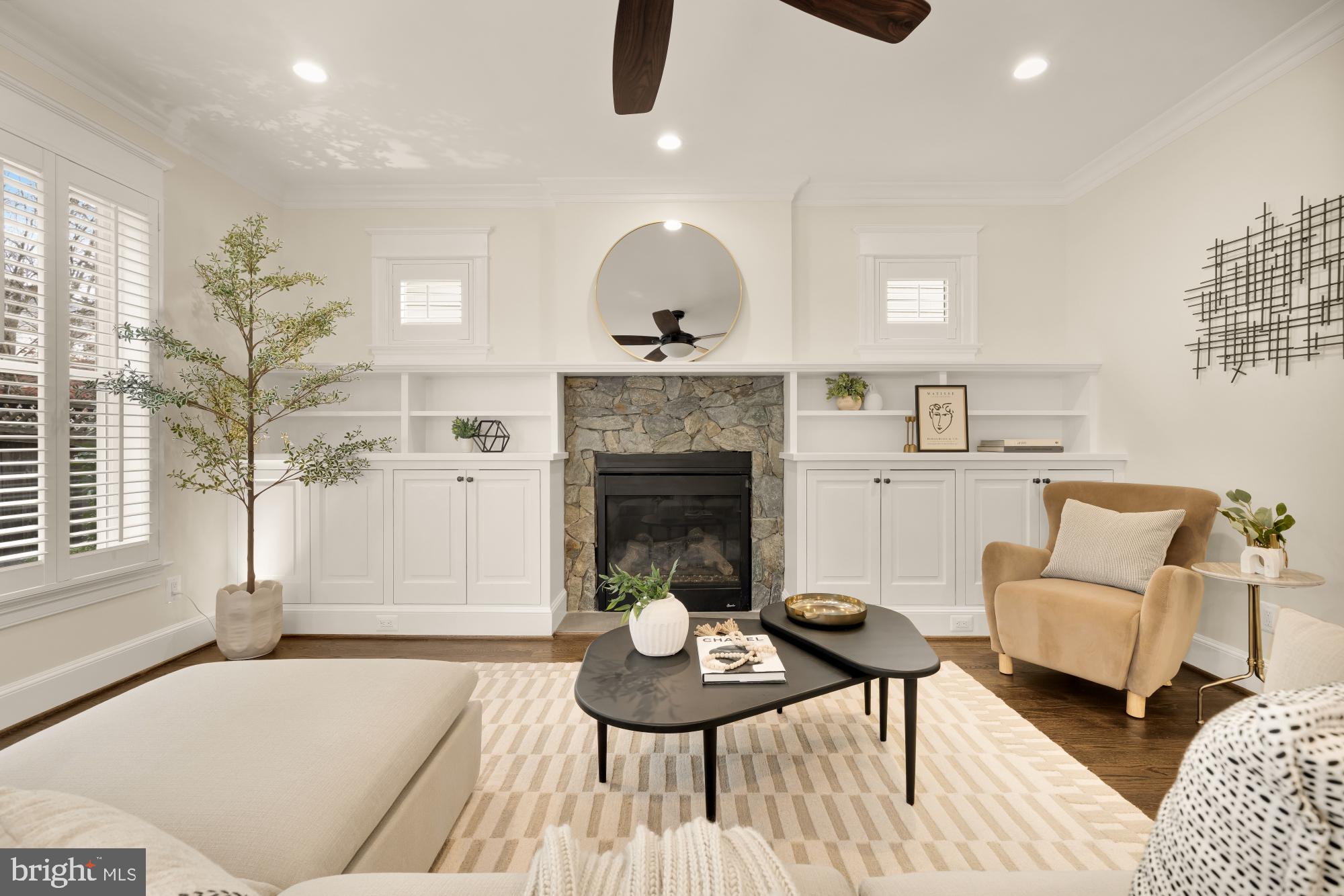 4609 Glenbrook Parkway Bethesda, MD 20814 - Photo 19 of 62 a living room with furniture and a fireplace