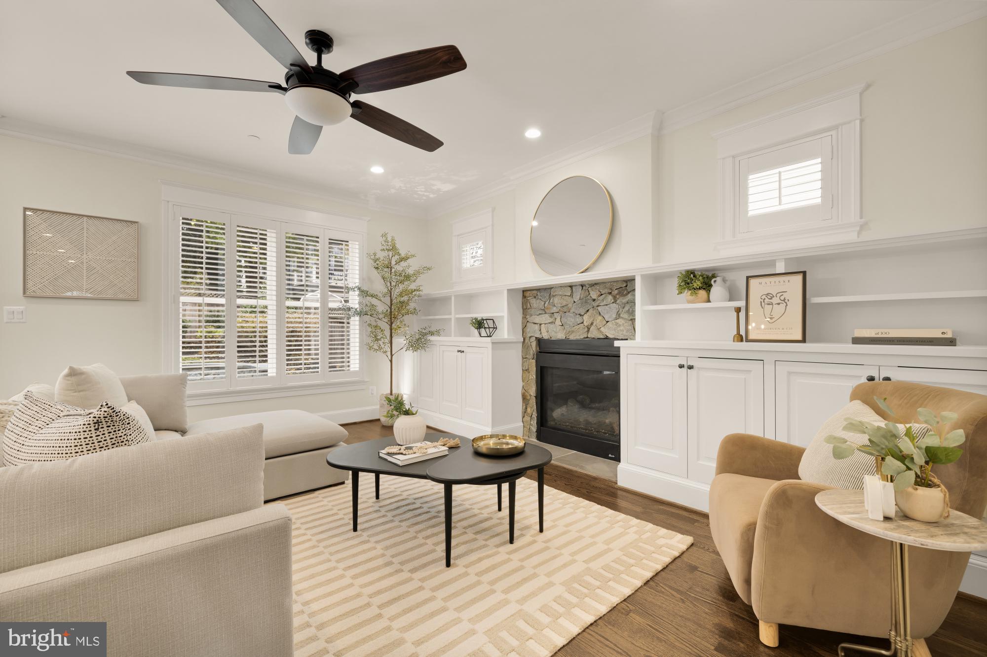 4609 Glenbrook Parkway Bethesda, MD 20814 - Photo 20 of 62 a living room with furniture and a fireplace