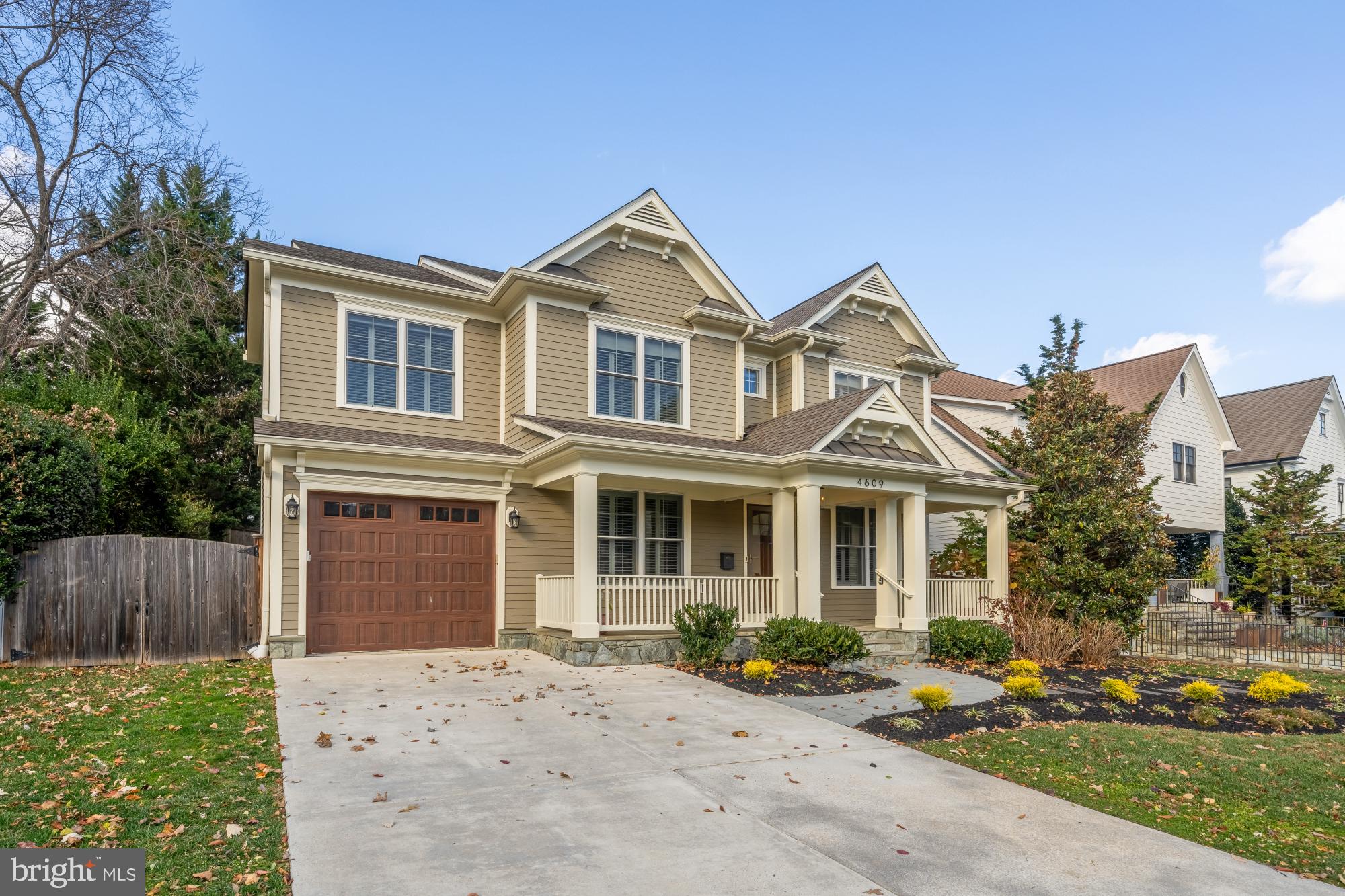 4609 Glenbrook Parkway Bethesda, MD 20814 - Photo 2 of 62 a front view of a house with a yard