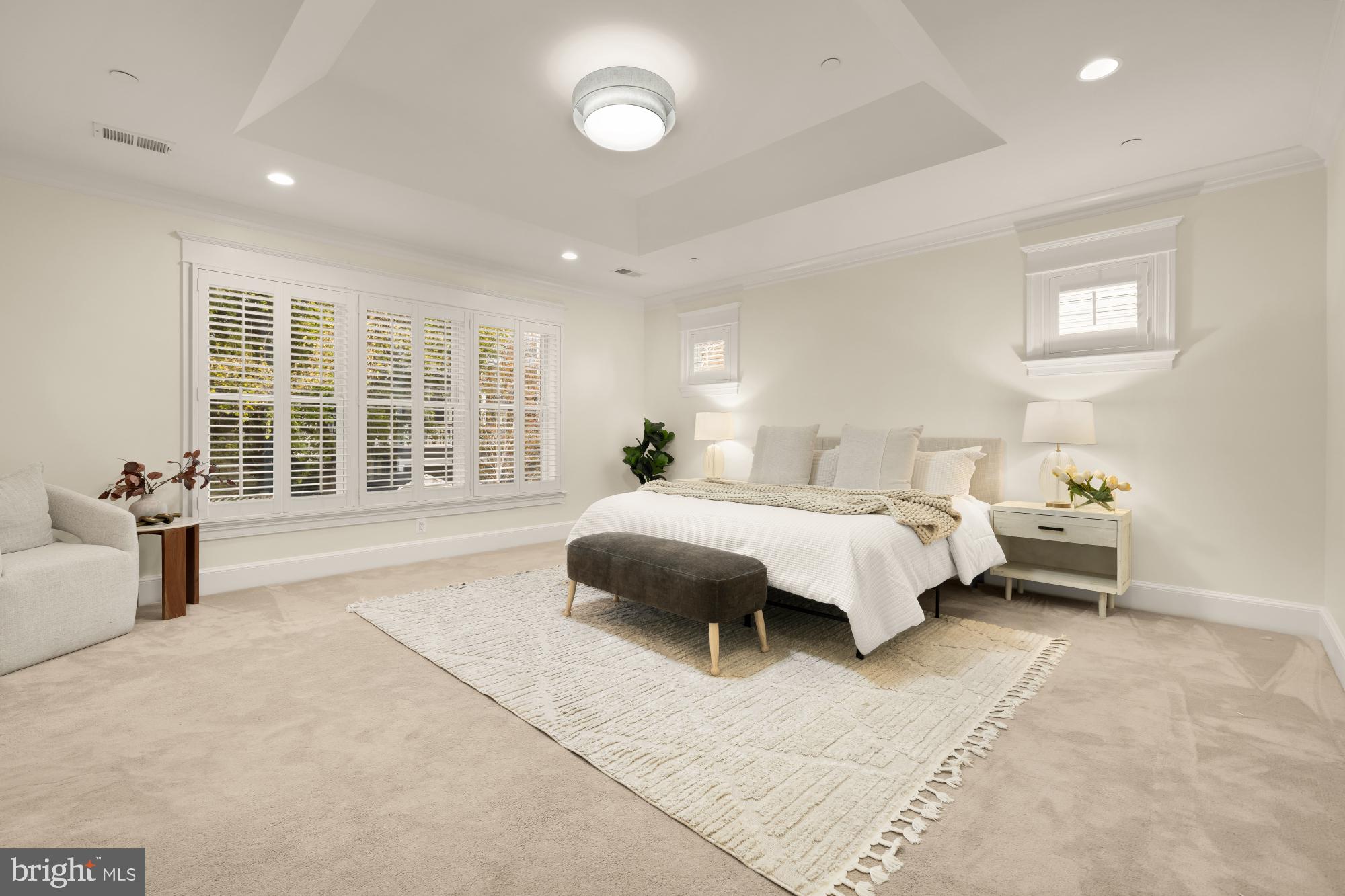 4609 Glenbrook Parkway Bethesda, MD 20814 - Photo 25 of 62 a spacious bedroom with a large bed and a large window