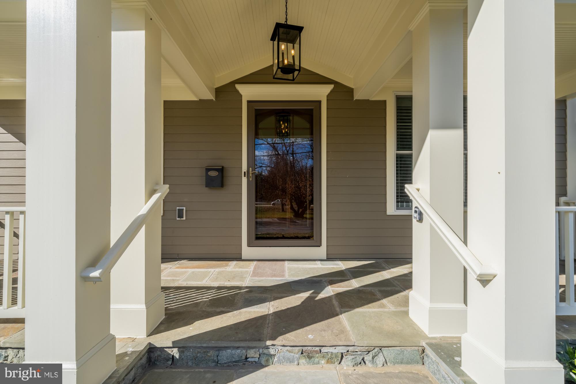 4609 Glenbrook Parkway Bethesda, MD 20814 - Photo 3 of 62 a view of a hallway with wooden floor and staircase