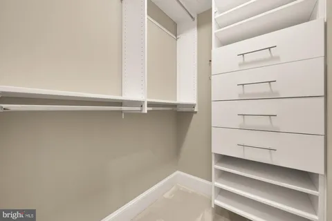 a bathroom with a toilet and a bathtub