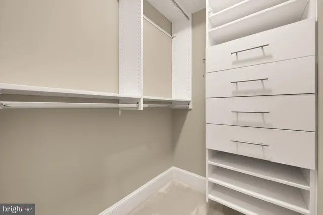 a bathroom with a toilet and a bathtub