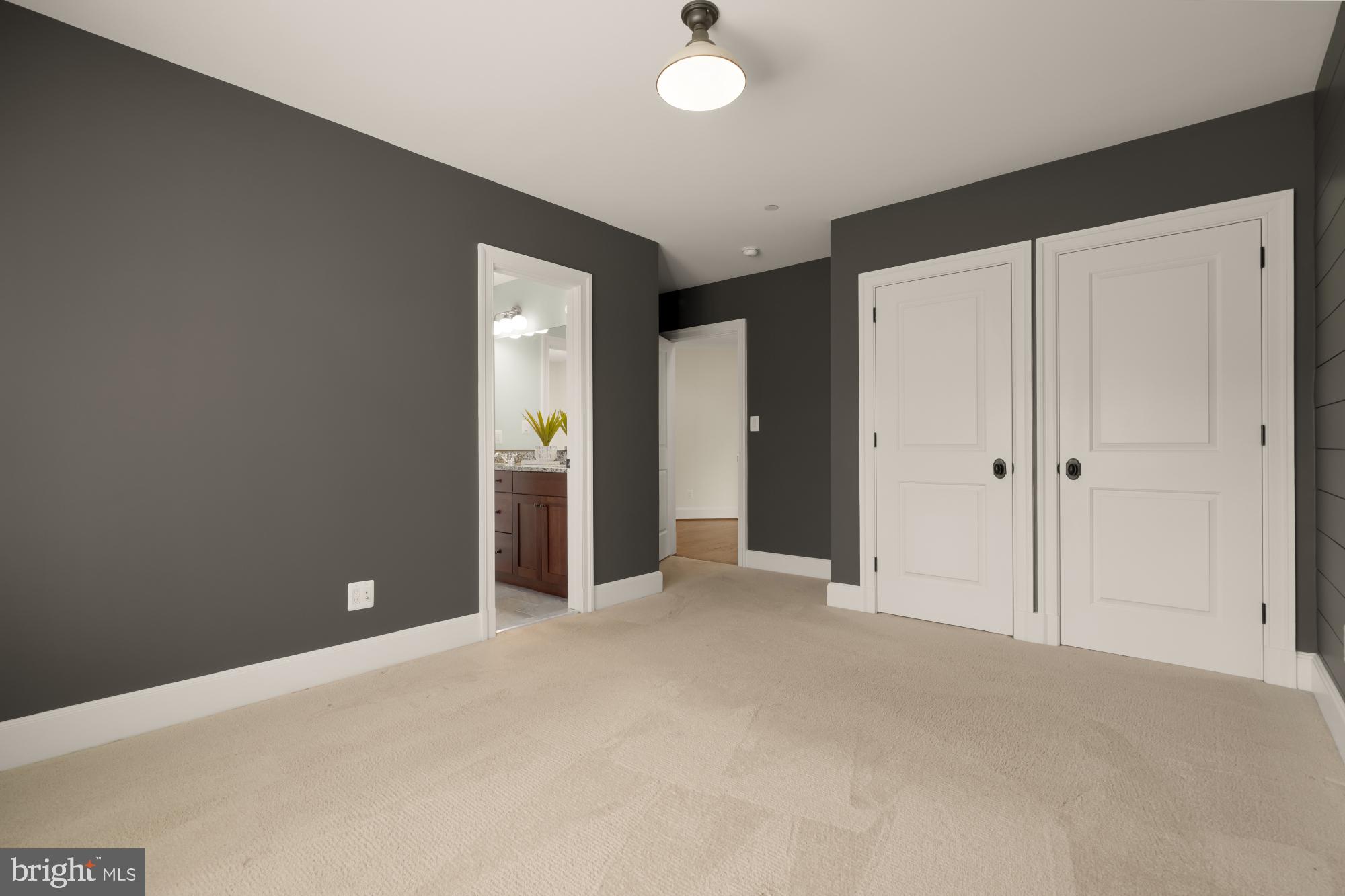 4609 Glenbrook Parkway Bethesda, MD 20814 - Photo 38 of 62 a view of an empty room with closet and wooden floor