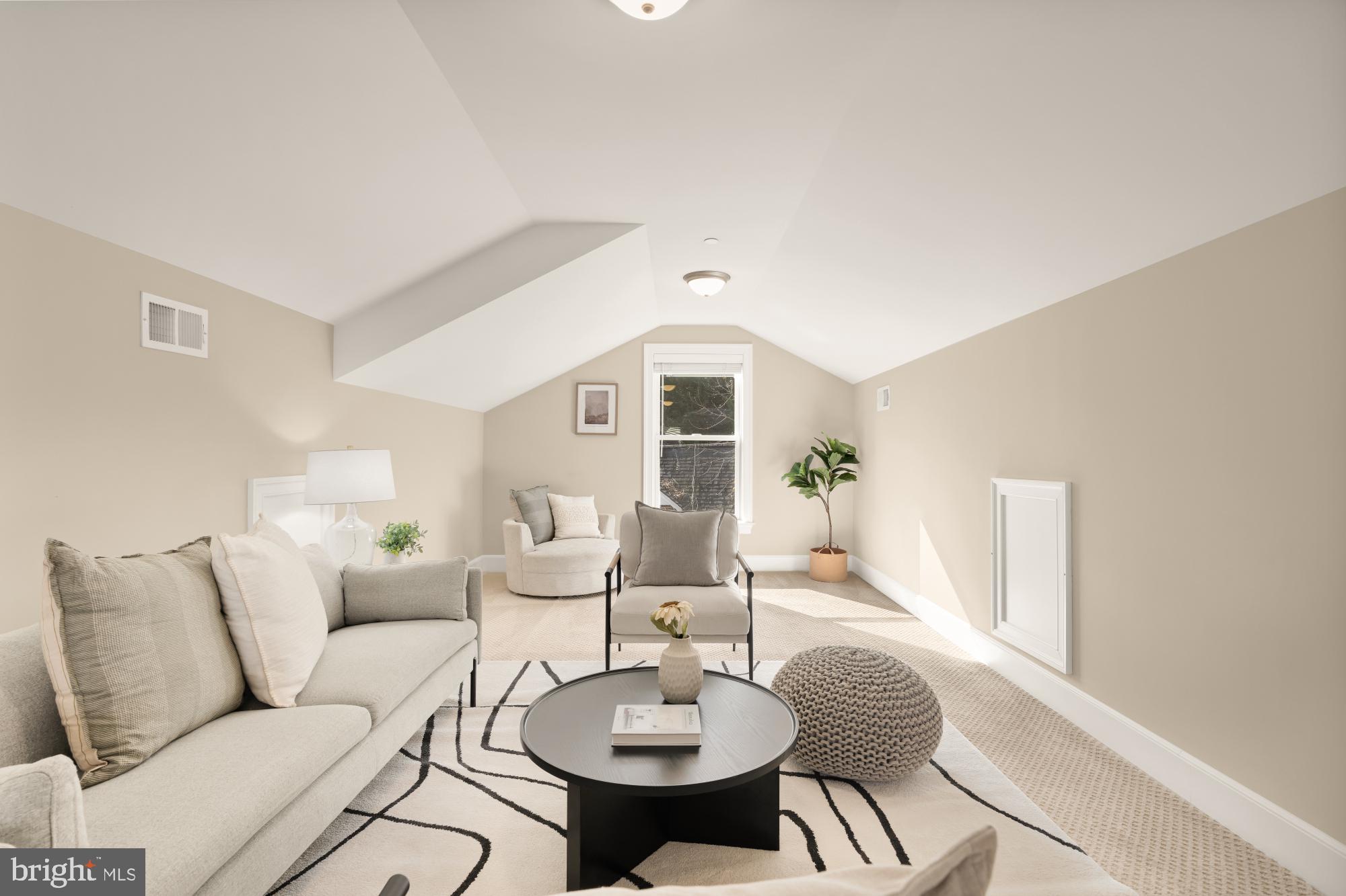 4609 Glenbrook Parkway Bethesda, MD 20814 - Photo 47 of 62 a living room with furniture and a table