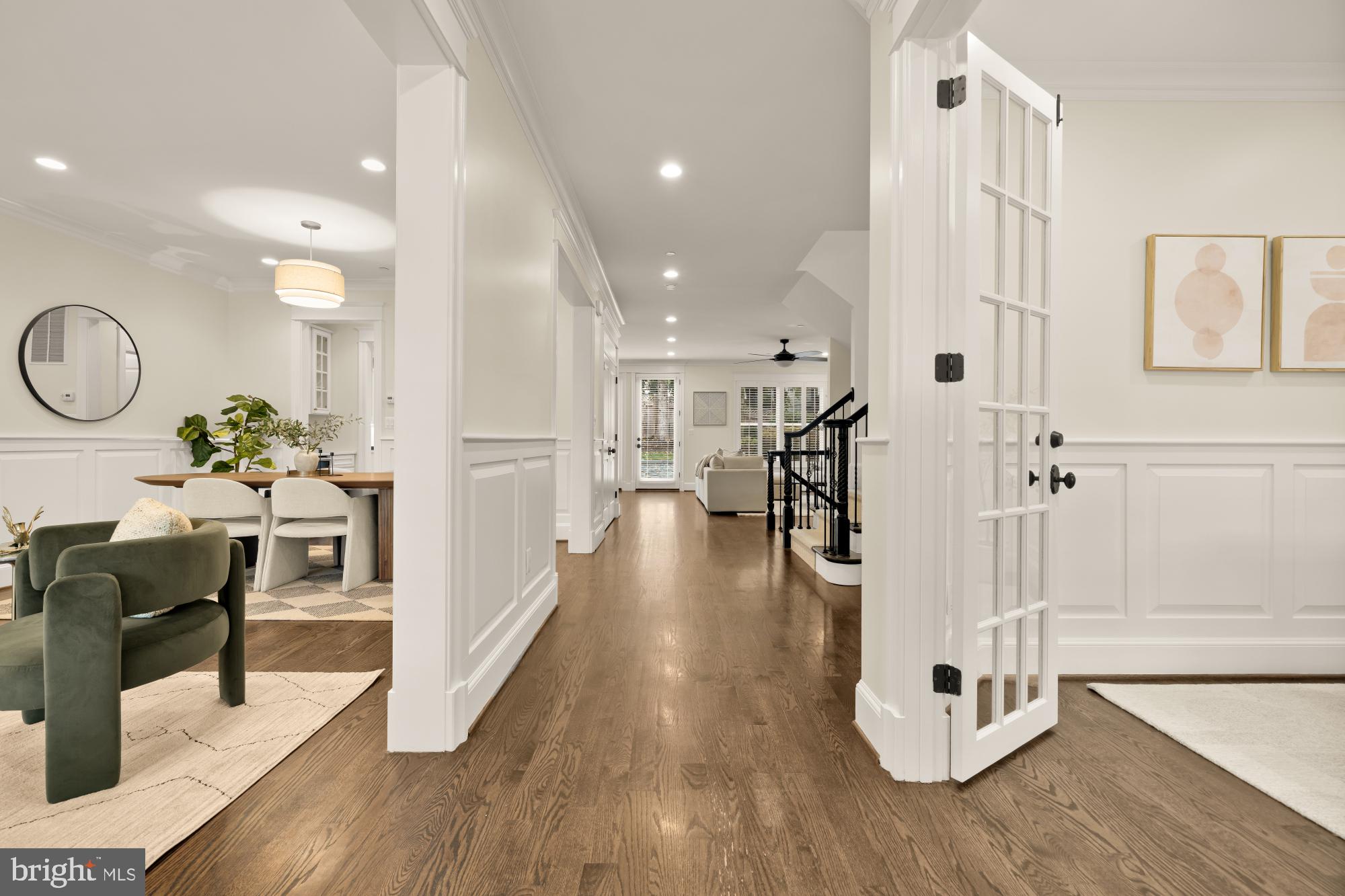 4609 Glenbrook Parkway Bethesda, MD 20814 - Photo 5 of 62 a view of a hallway with wooden floor and furniture