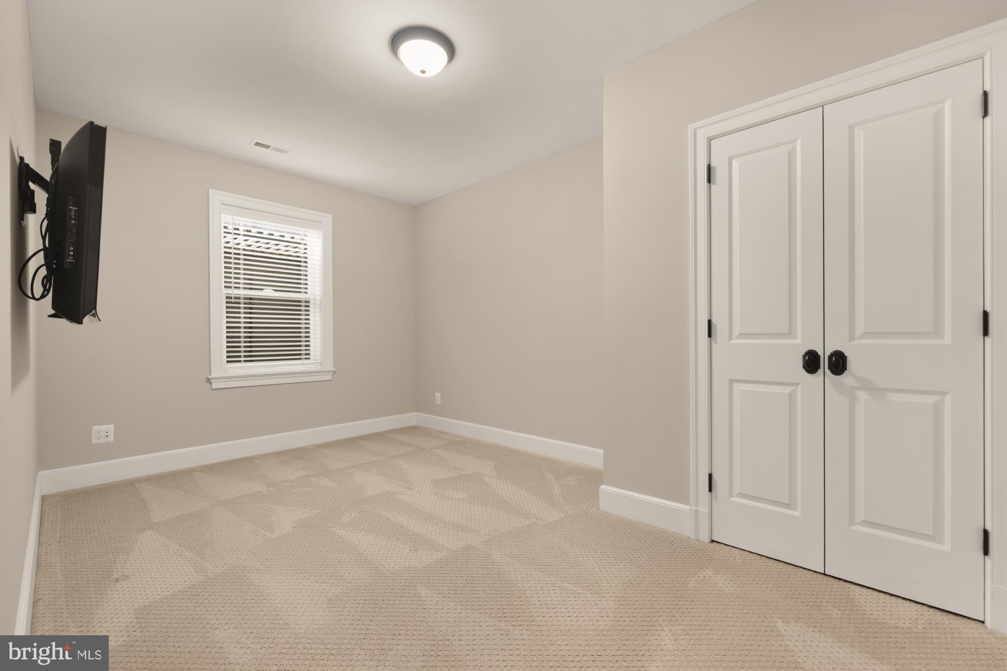 4609 Glenbrook Parkway Bethesda, MD 20814 - Photo 57 of 62 a view of an empty room with a window
