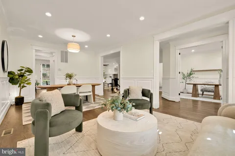a kitchen with stainless steel appliances a stove a sink and cabinets