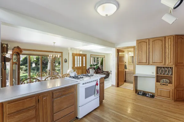 a kitchen with a sink stove and refrigerator