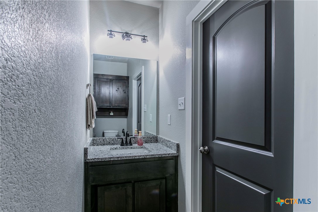 8323 Torrente Drive Temple, TX 76504 - Photo 29 of 30 a bathroom with a sink and a mirror