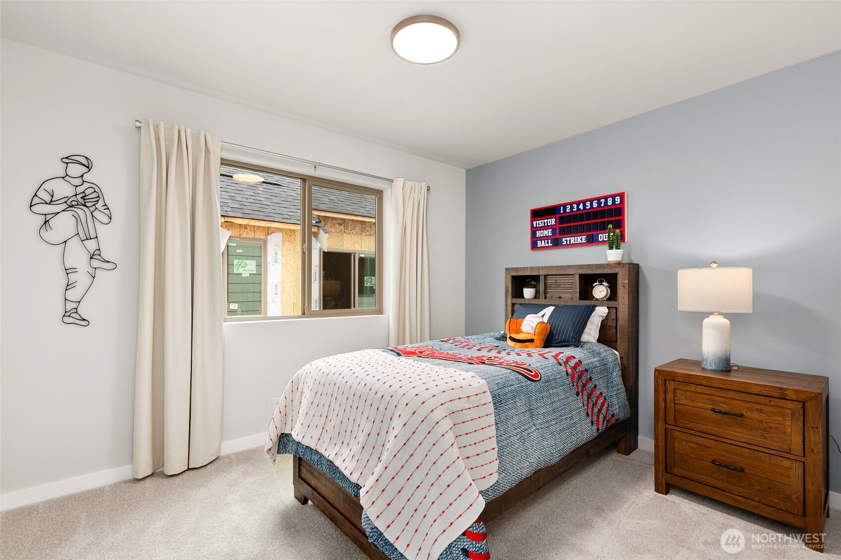 12506 Southeast 256th Place, Unit 8 Kent, WA 98030 - Photo 16 of 26 a bedroom with a bed and a window