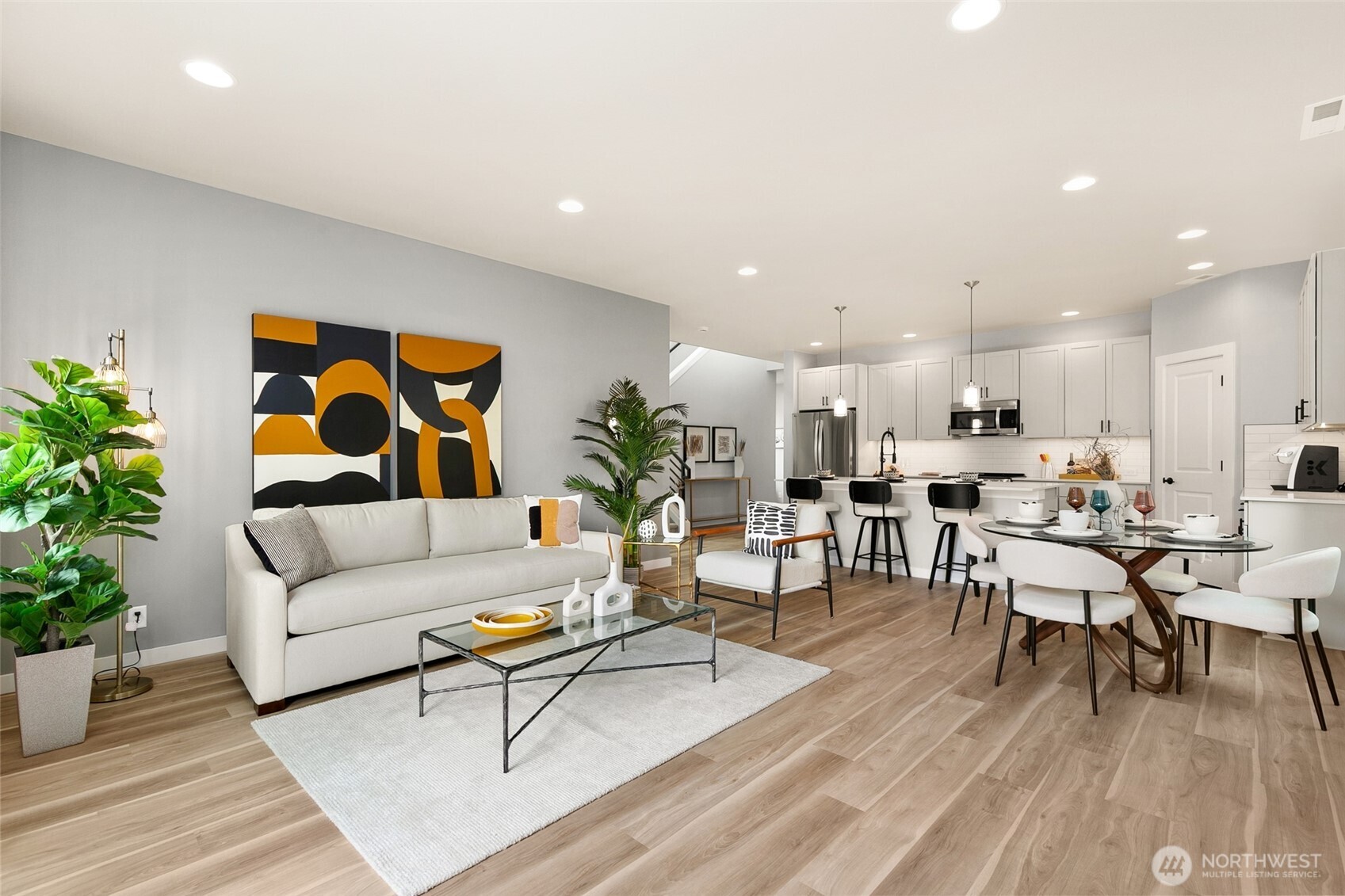 12506 Southeast 256th Place, Unit 8 Kent, WA 98030 - Photo 3 of 26 a living room with furniture and wooden floor
