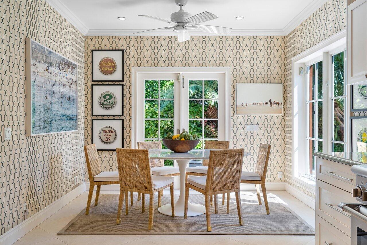 265 List Road Palm Beach, FL 33480 - Photo 12 of 38 a view of a dining room with furniture window and wooden floor