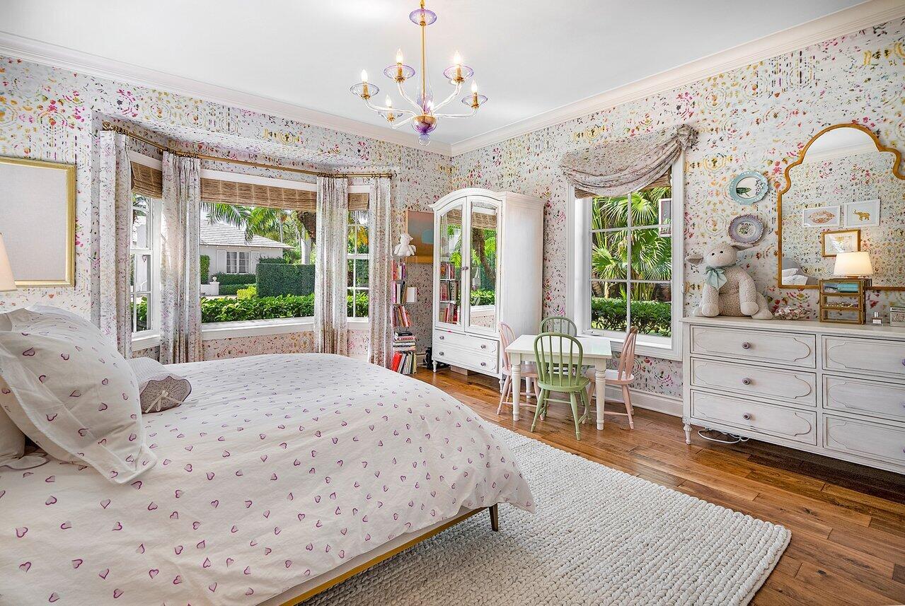 265 List Road Palm Beach, FL 33480 - Photo 29 of 38 a bedroom with a bed mirror and window