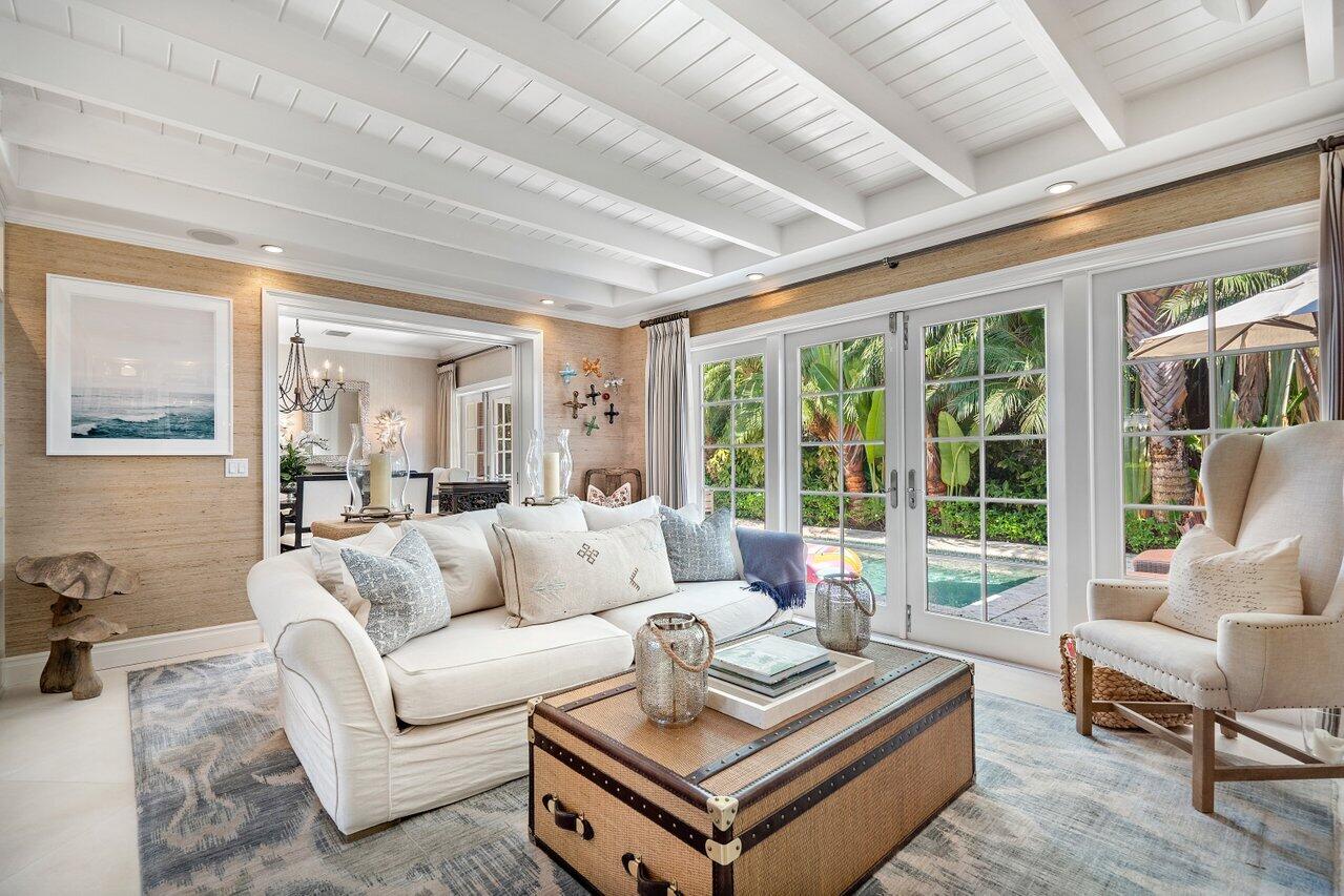 265 List Road Palm Beach, FL 33480 - Photo 7 of 38 a living room with furniture and a large window