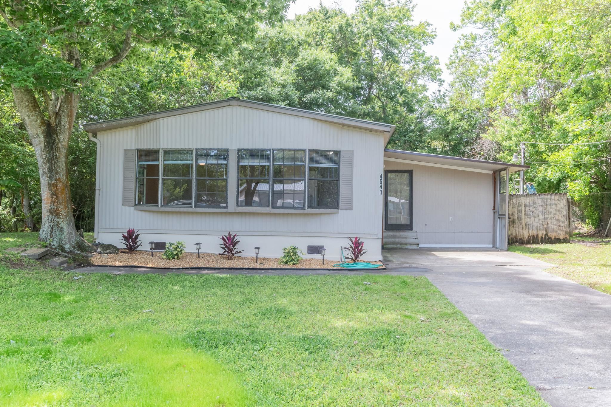 4541 Fourth Avenue St. Augustine, FL 32095 - Photo 1 of 32 a house that has sitting area in front of it