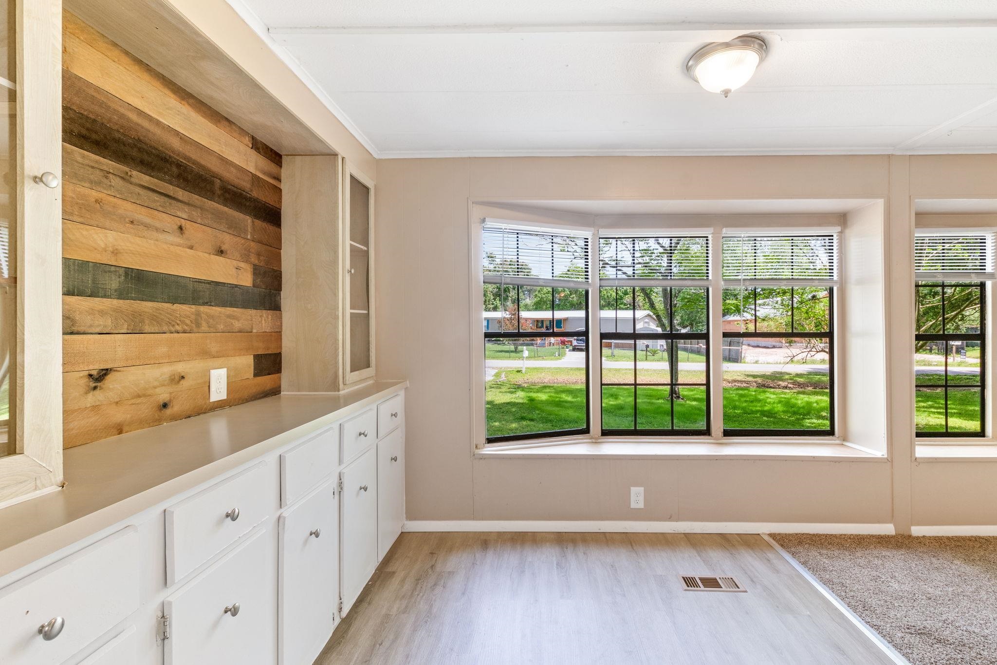 4541 Fourth Avenue St. Augustine, FL 32095 - Photo 11 of 32 a view of lot of window and wooden floor