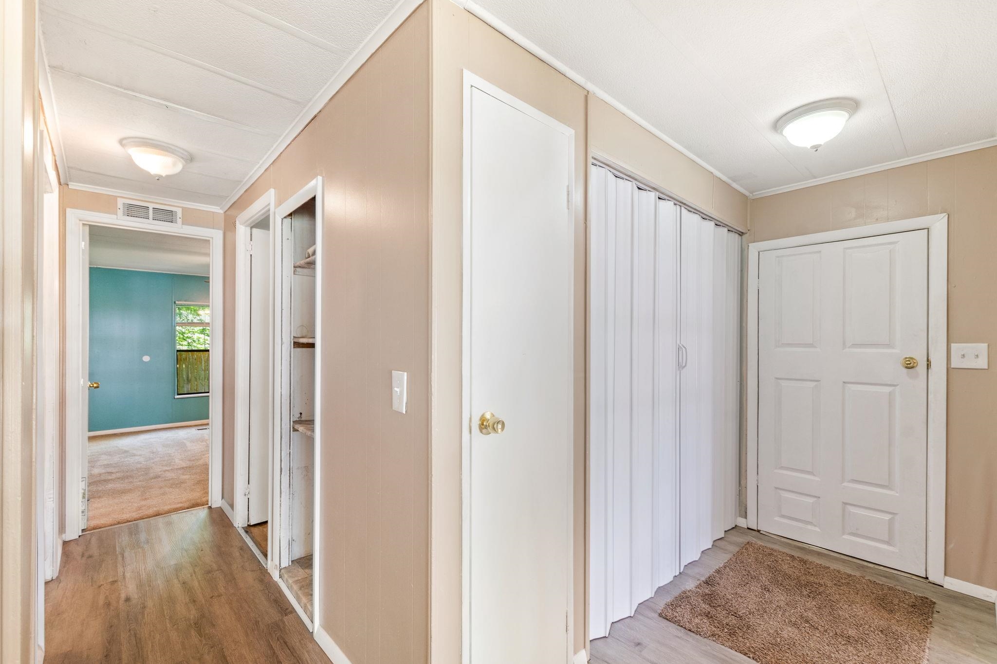 4541 Fourth Avenue St. Augustine, FL 32095 - Photo 19 of 32 a view of a hallway with wooden floor and closet area