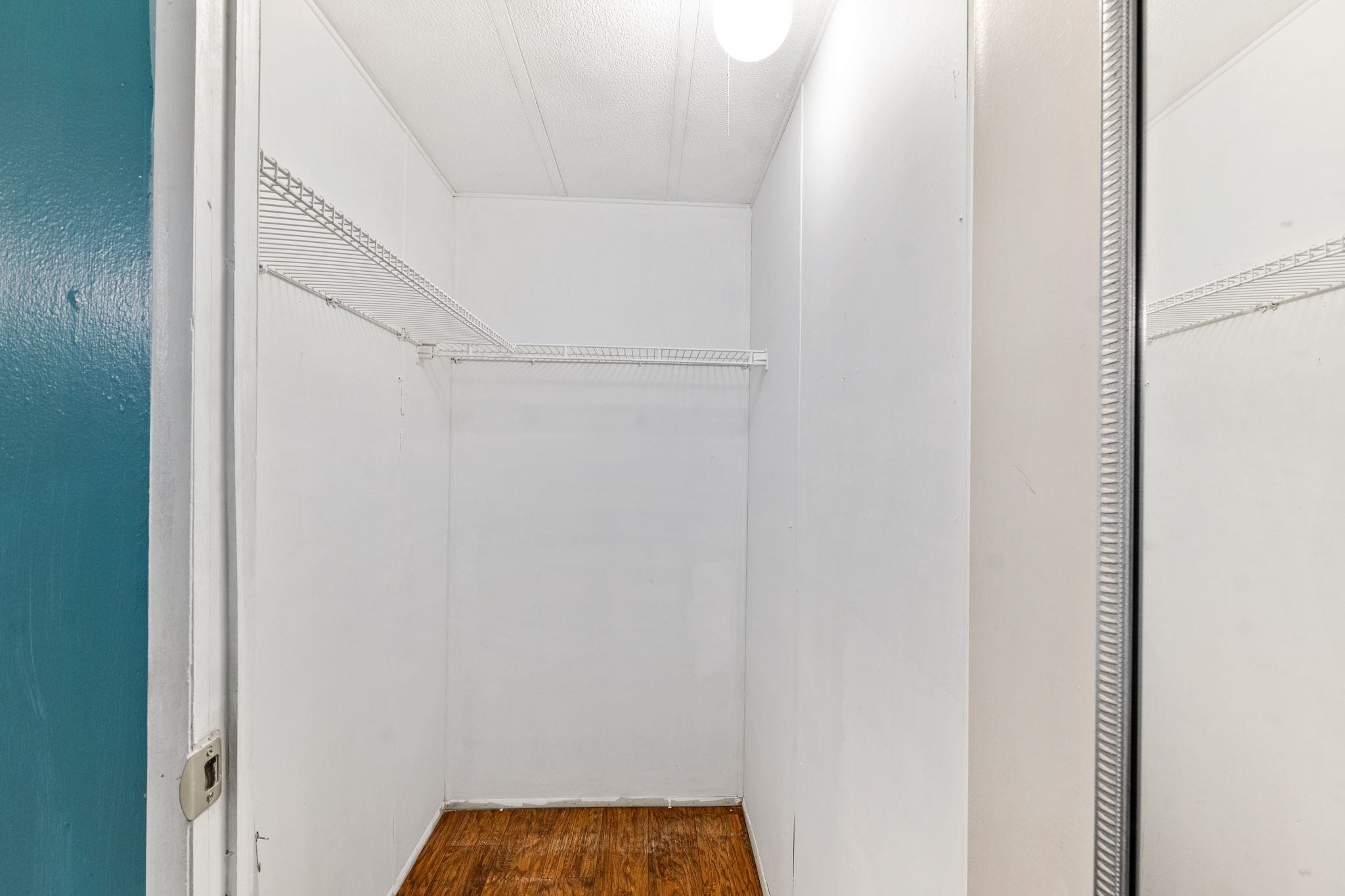 4541 Fourth Avenue St. Augustine, FL 32095 - Photo 23 of 32 a small space with an empty walk in closet