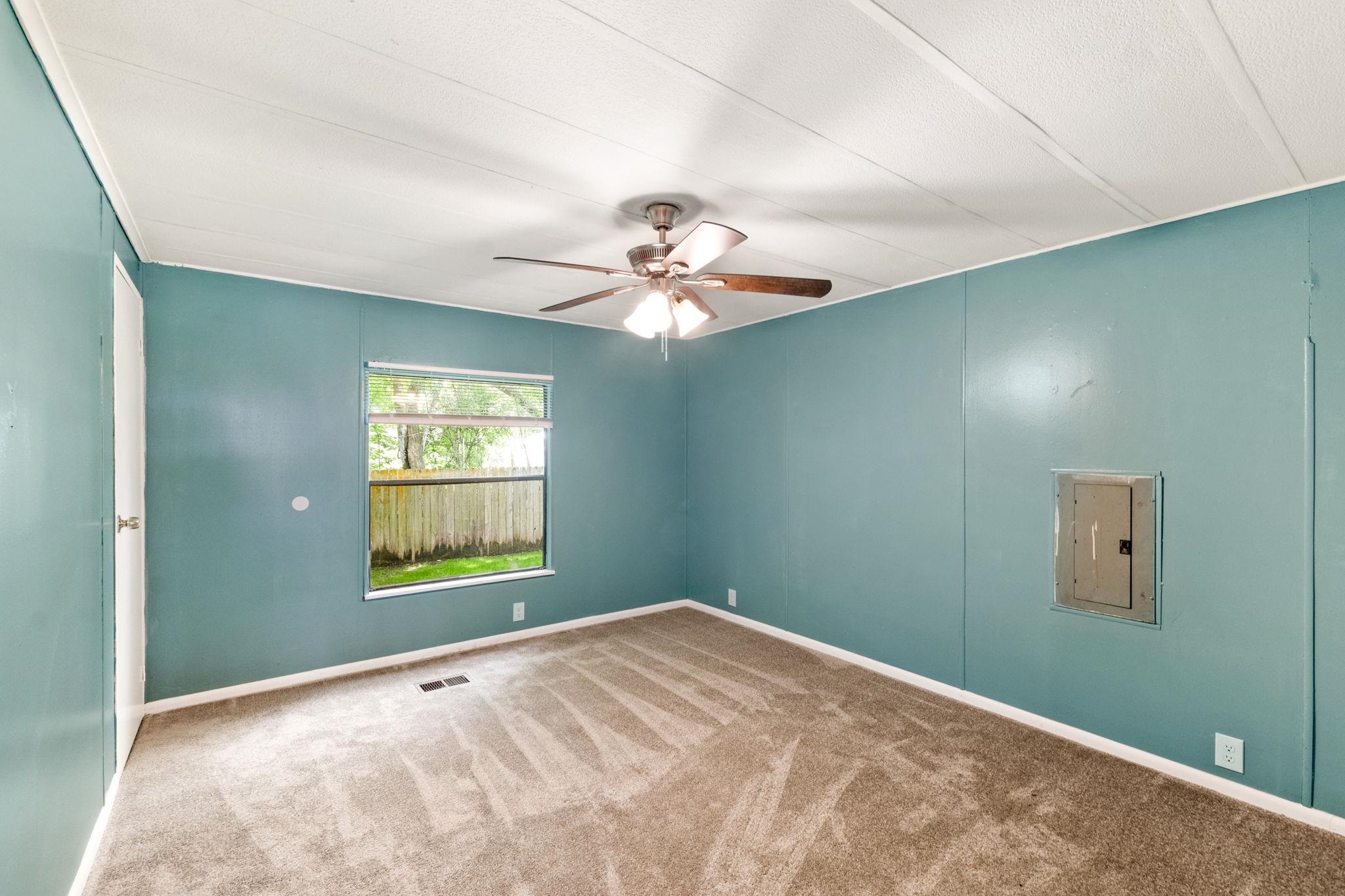 4541 Fourth Avenue St. Augustine, FL 32095 - Photo 24 of 32 a view of a room with a window and a ceiling fan