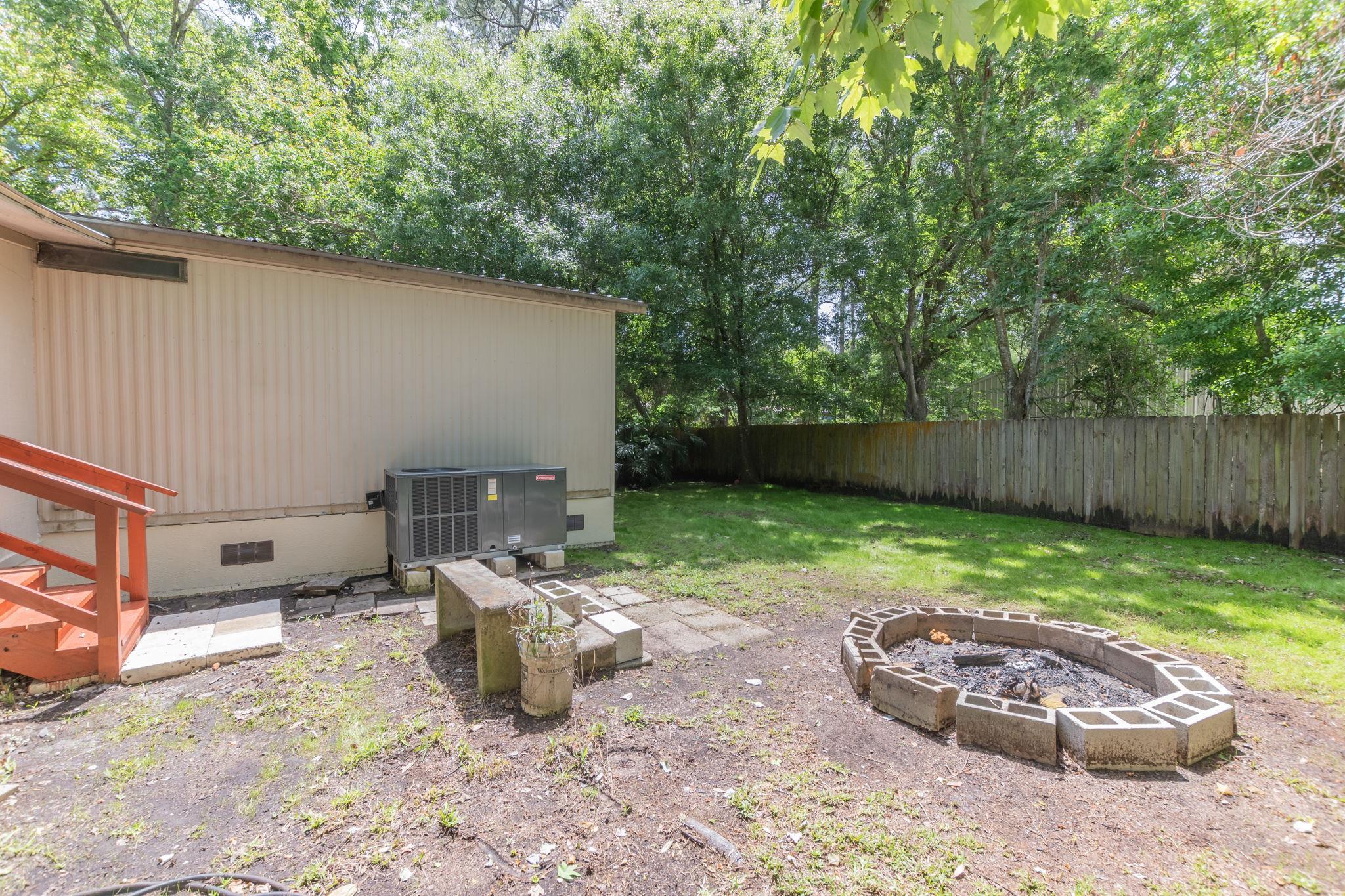 4541 Fourth Avenue St. Augustine, FL 32095 - Photo 29 of 32 a view of a backyard with furniture and garden