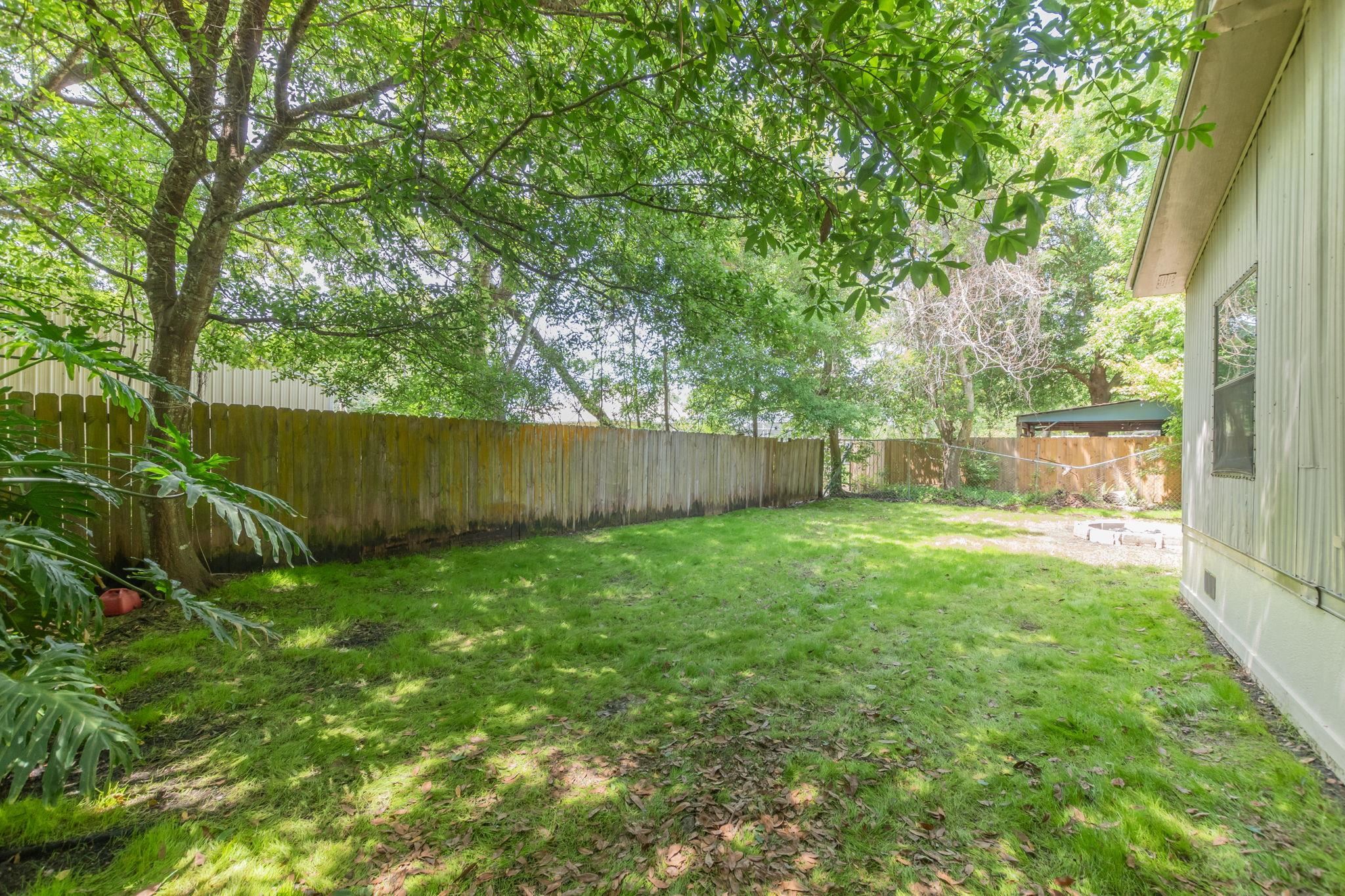 4541 Fourth Avenue St. Augustine, FL 32095 - Photo 32 of 32 a view of a yard with a tree