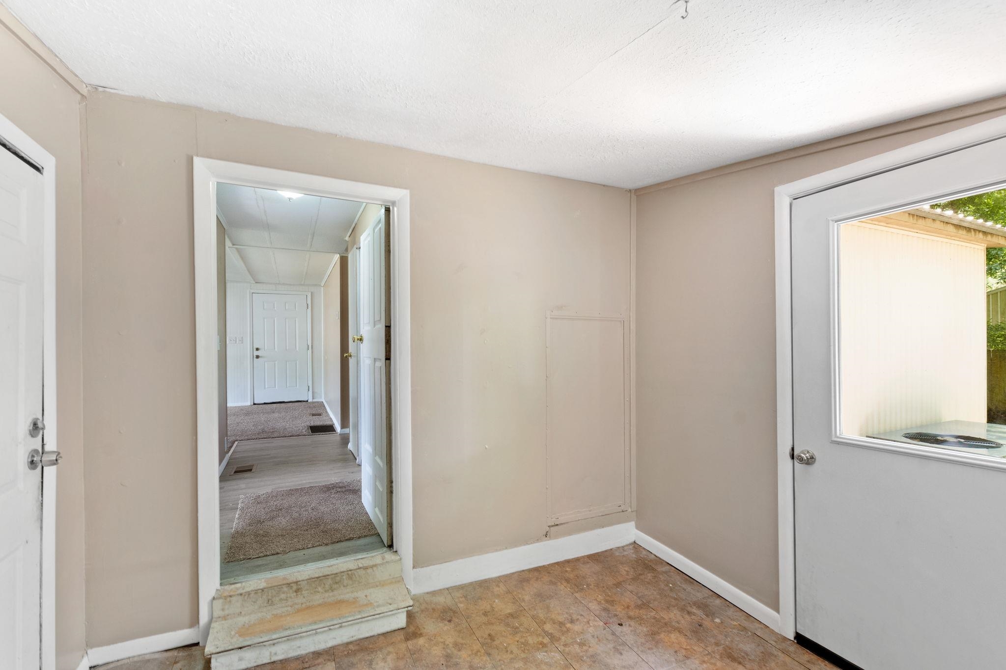 4541 Fourth Avenue St. Augustine, FL 32095 - Photo 5 of 32 a view of a bathroom with a glass door and a bathroom
