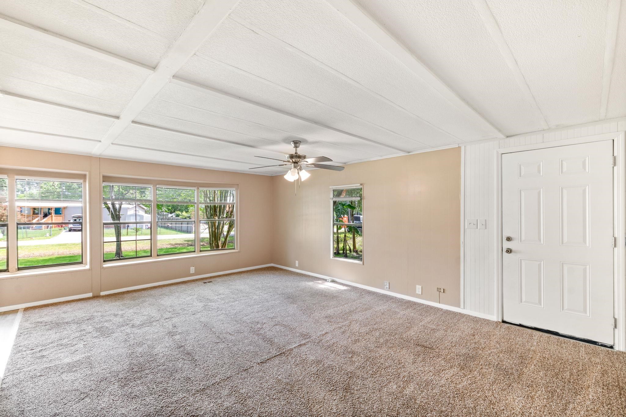 4541 Fourth Avenue St. Augustine, FL 32095 - Photo 7 of 32 an empty room with windows and entrance