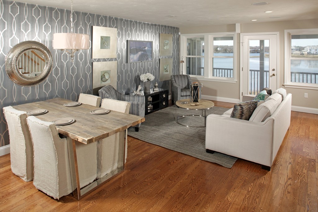 7 Bay Street, Unit 10 Hull, MA 02045 - Photo 6 of 10 a living room with stainless steel appliances granite countertop furniture and a wooden floor