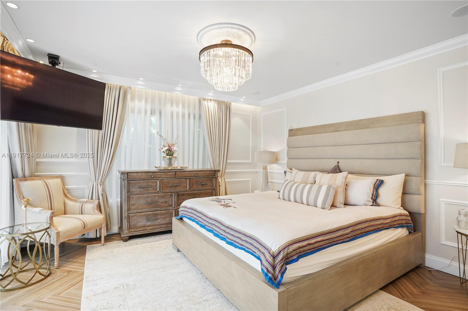 1625 Daytonia Road Miami Beach, FL 33141 - Photo 14 of 39 a bed room with a bed and a chair