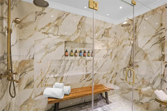 a bathroom with a shower curtain and a sink